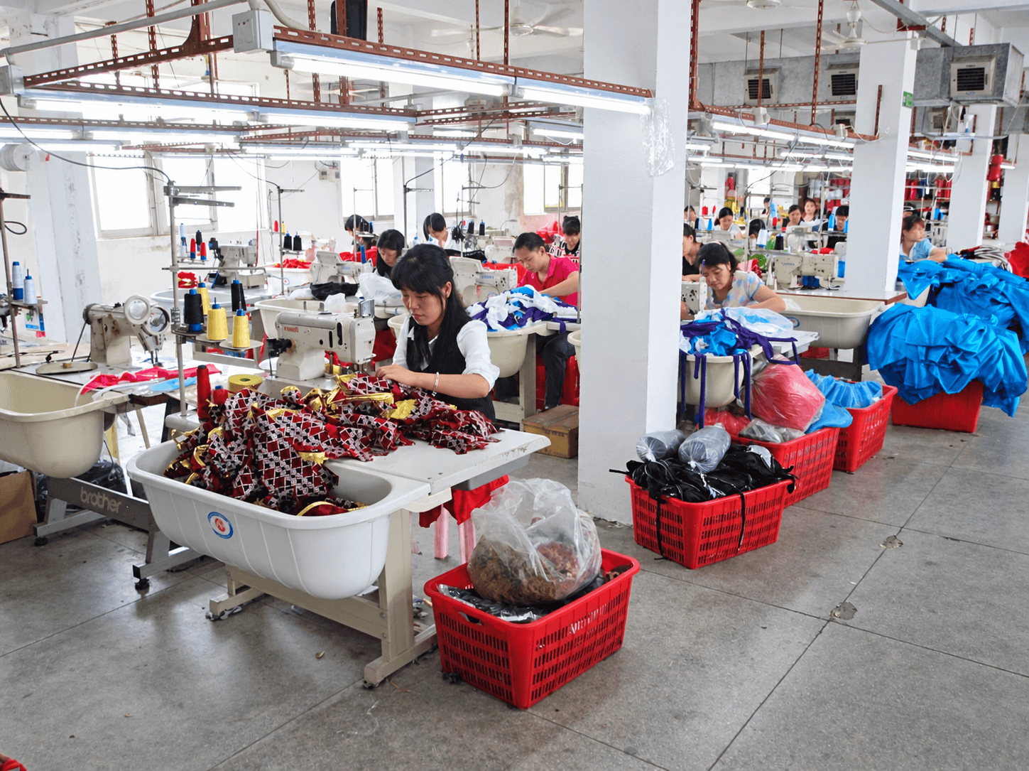 Supplied sewing line with garments in production